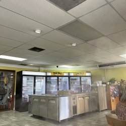 Self-serve area to make sauces, vegetables, noodles, beef balls, shrimp etc.
