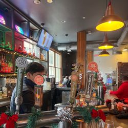 Base Camp Bar & Grill - Decorated for Xmas. Healthy poke bowls to chicken tenders!