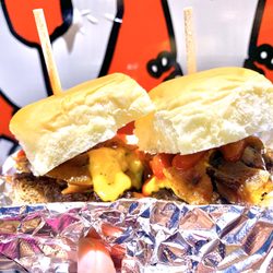 Slider Provider - Chuck Norris with caramelized onions, Sriracha ketchup, American cheese, and bacon