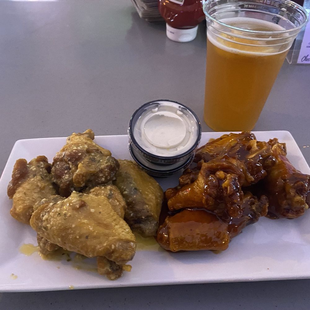 Jasper Kitchen + Bar - Garlic Parmesan and Bourbon wings.  Blue Moon - Burgers Near Me - Xenia, Ohio