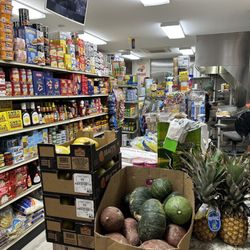 Allentown Cheesesteak & Grocery - Small grocery section with fresh produce.