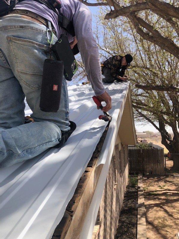 Slide of Dinger Roofing