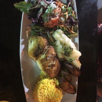 Sofrito Latin Cafe - Pargo/Snapper with yellow rice, yuca, and plantains - Latin American Near Me - Orlando, Florida Sofrito Latin Cafe - Pargo/Snapper with yellow rice, yuca, and plantains - Latin American Near Me - Orlando, Florida