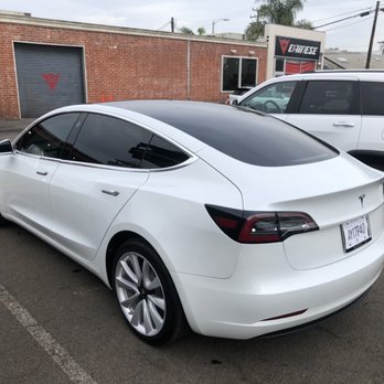 Beach Cities Tint Shop - Tesla Model 3 CTX 35 on front, CTX 15 on rear, Air80 on windshield and PPF on center console - Car Window Tinting Near Me - Costa Mesa, California