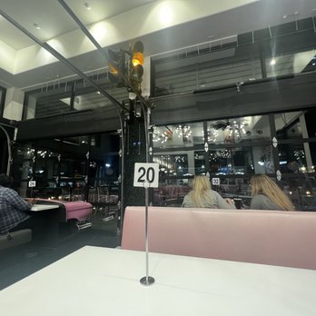 Frisco's Carhops - View from the "back seat" cadillac booth - American Near Me - Whittier, California Frisco's Carhops - View from the "back seat" cadillac booth - American Near Me - Whittier, California