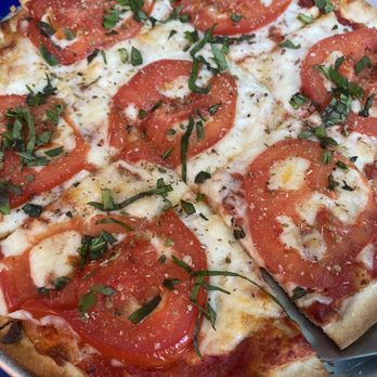 Biundo's - Cheese pizza, add tomato and Basil. - Pizza Near Me - Venus, Texas Biundo's - Cheese pizza, add tomato and Basil. - Pizza Near Me - Venus, Texas