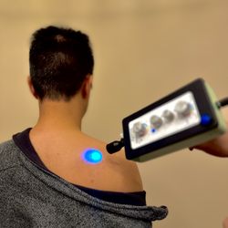 Chromatic Wellness Center - Shoulder treatment.  Restoring full range of motion.