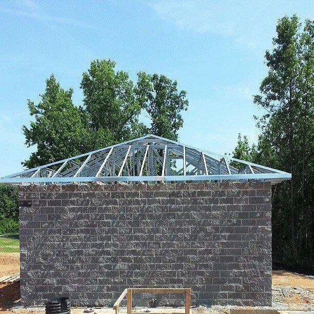 Slide of Patch Adams Roofing