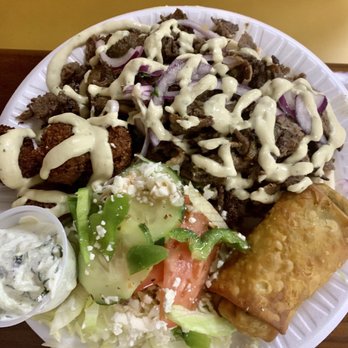 Nazareth Bread - Shawarma platter with Greek salad, spinach pie, and falafel. Underneath the shawarma is a bed of pita soaking up the wonderful juices. - Mediterranean Near Me - Greensboro, North Carolina Nazareth Bread - Shawarma platter with Greek salad, spinach pie, and falafel. Underneath the shawarma is a bed of pita soaking up the wonderful juices. - Mediterranean Near Me - Greensboro, North Carolina