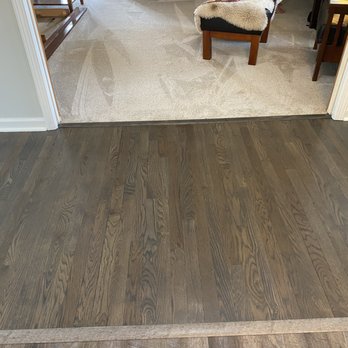 Burton's Flooring Center - a hardwood floor in a living room - Carpet Cleaning Near Me - Franklin, Indiana