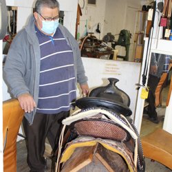 Oscar's Custom Boots & Shoe Repair - Oscar Crus with a 1940 saddle he restored