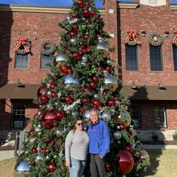The Christmas Place - Outside tree with my wife
