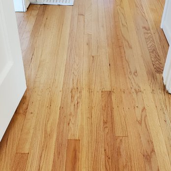 Open Book Hardwood Floors - a view of a hallway - Flooring Near Me