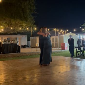 Desert Willow Events - Mom/Son dance on the dance floor. - Wedding Planning Near Me