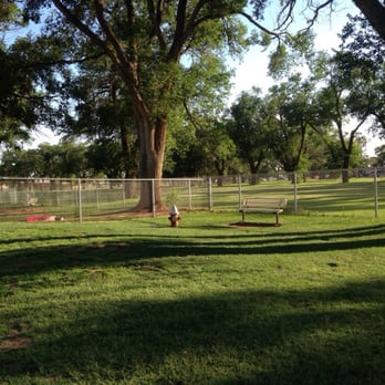 Hillcrest Dog Park - Bench areas to sit and small red dog pool in the large dog area - Dog Parks Near Me - Clovis, New Mexico