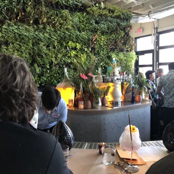 Colita - Cool living wall behind the bar - New American Near Me - Minneapolis, Minnesota Colita - Cool living wall behind the bar - New American Near Me - Minneapolis, Minnesota