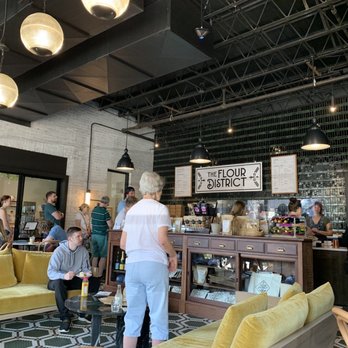 The Flour District - a group of people in a coffee shop - Coffee & Tea Near Me - Lynchburg, Virginia