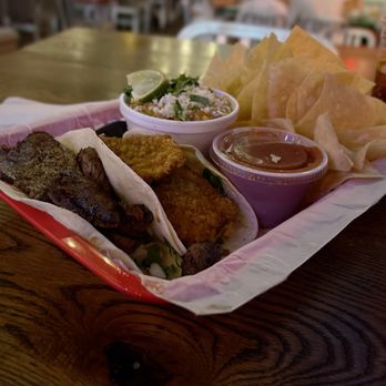 Taco Mama - Dilworth - The whole deal, steak in front, fish then street corn and salsa/chips - Mexican Near Me - Charlotte, North Carolina Taco Mama - Dilworth - The whole deal, steak in front, fish then street corn and salsa/chips - Mexican Near Me - Charlotte, North Carolina