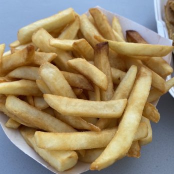 Rivers Edge Drive In - a plate of french fries and a container of ketchup - Food Stands Near Me - Machias, Maine Rivers Edge Drive In - a plate of french fries and a container of ketchup - Food Stands Near Me - Machias, Maine
