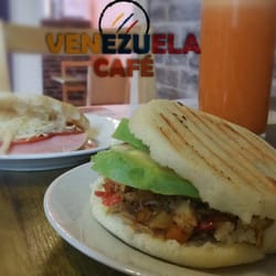 Venezuela cafe - Grilled Arepa, Venezuelan signature sandwich, made with gluten free corn flour. Fillings chosen by customers preference