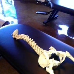 Back in a Flash Chiropractic and Massage - Spine model on one of our adjusting tables.