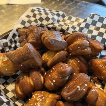 Rio Bravo Brewing - Pretzel bites - Pretzel bites with a caramelized exterior and coarse salt are served in a checkered paper-lined basket. - American Near Me - Albuquerque, New Mexico
