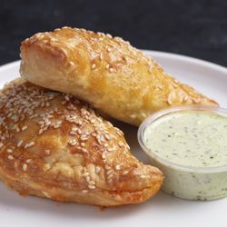 The Chicken Koop - Chicken Tinga empanadas with green sauce
