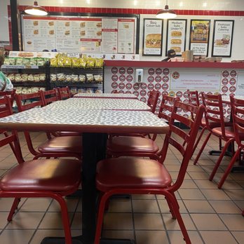 Firehouse Subs - tables and chairs in a restaurant - Sandwiches Near Me - Sandy, Utah