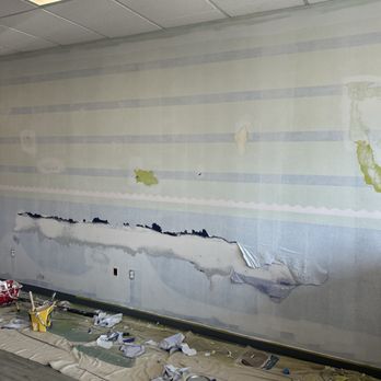 Elite77 Painters - Update: We hired another crew to sand / prime the wall since it was peeling. The paint over raw spackle peeled off in sheets. - Painters Near Me - Kansas City, Missouri Elite77 Painters - Update: We hired another crew to sand / prime the wall since it was peeling. The paint over raw spackle peeled off in sheets. - Painters Near Me - Kansas City, Missouri