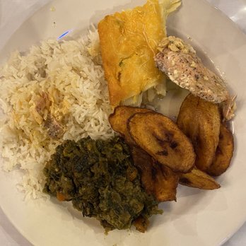 Mirelle's Restaurant - White rice, sweet plantain, lalo (Haitian spinach stew), Baked Salmon, and baked macaroni - Caterers Near Me - Westbury, New York Mirelle's Restaurant - White rice, sweet plantain, lalo (Haitian spinach stew), Baked Salmon, and baked macaroni - Caterers Near Me - Westbury, New York