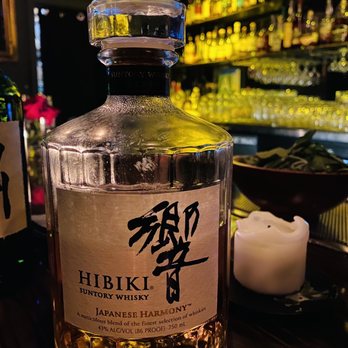 neat - a bottle of hibiki whisky on a bar - Cocktail Bars Near Me - Los Angeles, California neat - a bottle of hibiki whisky on a bar - Cocktail Bars Near Me - Los Angeles, California