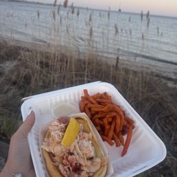 Warm lobster roll with sweet potato fries
