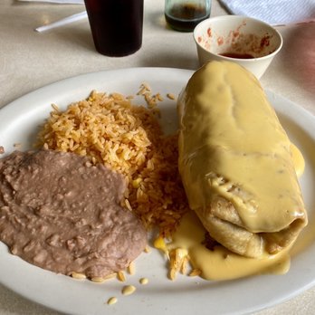 Taqueria Chapala #1 - This is a chicken chimichanga served with rice and refried beans. - Mexican Near Me - Austin, Texas Taqueria Chapala #1 - This is a chicken chimichanga served with rice and refried beans. - Mexican Near Me - Austin, Texas