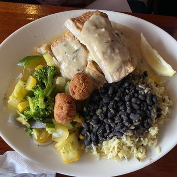 Pompano Joe's - Mahi - mahi bajan with black bean and rice side - Seafood Near Me - Destin, Florida