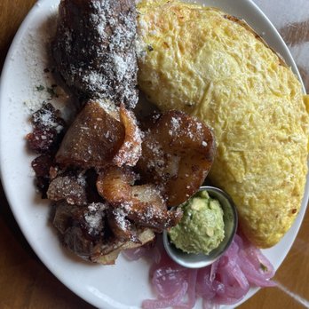 Tupelo Honey Southern Kitchen & Bar - Omelette and potatoes - Breakfast & Brunch Near Me - Chattanooga, Tennessee Tupelo Honey Southern Kitchen & Bar - Omelette and potatoes - Breakfast & Brunch Near Me - Chattanooga, Tennessee