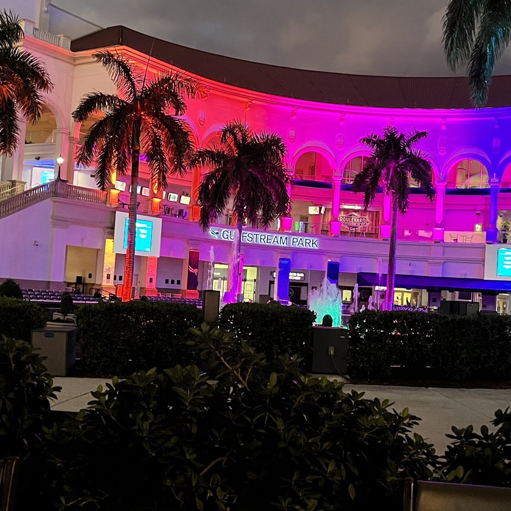 Christine Lee's - a brightly lit building with palm trees in front of it - Asian Fusion Near Me - Hallandale Beach, Florida Christine Lee's - a brightly lit building with palm trees in front of it - Asian Fusion Near Me - Hallandale Beach, Florida