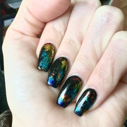 I could not decide what color to get so Tina created these beautiful rainbow foil nails! They look just like autumn leaves in the sun