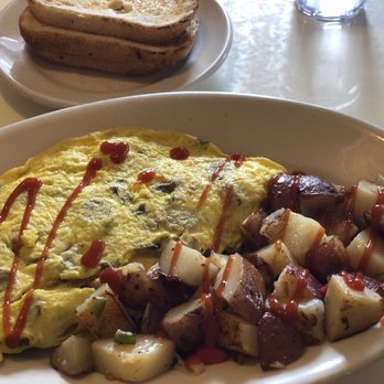 Sams Cafe - Ham, mushroom, & cheese omelette (substituted ham for sausage) with sourdough bread. - Breakfast & Brunch Near Me - Half Moon Bay, California Sams Cafe - Ham, mushroom, & cheese omelette (substituted ham for sausage) with sourdough bread. - Breakfast & Brunch Near Me - Half Moon Bay, California
