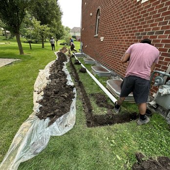 L&P Basement Waterproofing - Installing exterior PVC drainage lines and downspout extensions to direct water away from the foundation. - Waterproofing Near Me - Glendale Heights, Illinois L&P Basement Waterproofing - Installing exterior PVC drainage lines and downspout extensions to direct water away from the foundation. - Waterproofing Near Me - Glendale Heights, Illinois