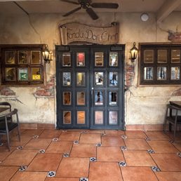 Front entrance. Covered patio seating available.