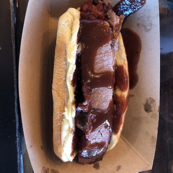 Caldwell County Mexi-Q - Brisket Beef hot dog with Barbecue sauce and the Hot N' Sweet sauce - Barbeque Near Me - Gilbert, Arizona