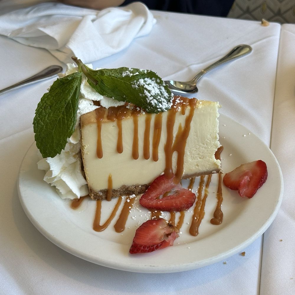 Mangiamo Ristorante - New Youk Style Cheesecake Served with Dolce de Leche - Italian Near Me - Manhattan Beach, California Mangiamo Ristorante - New Youk Style Cheesecake Served with Dolce de Leche - Italian Near Me - Manhattan Beach, California