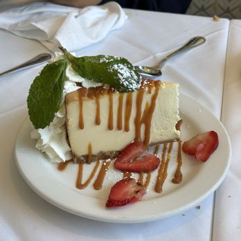 Mangiamo Ristorante - New Youk Style Cheesecake Served with Dolce de Leche - Italian Near Me - Manhattan Beach, California Mangiamo Ristorante - New Youk Style Cheesecake Served with Dolce de Leche - Italian Near Me - Manhattan Beach, California