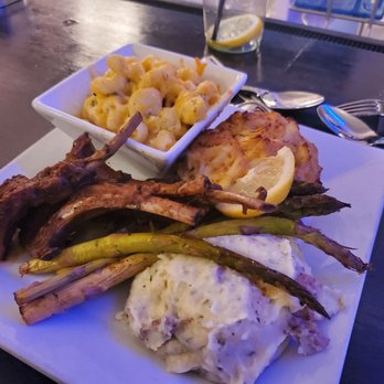 Papi Cuisine - Lamb chops, crab cake (no filler), asparagus, mac and cheese, asiago mash - Cocktail Bars Near Me - Baltimore, Maryland Papi Cuisine - Lamb chops, crab cake (no filler), asparagus, mac and cheese, asiago mash - Cocktail Bars Near Me - Baltimore, Maryland