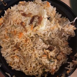 "Biriyani" aka white rice with grey chicken, that I had already doused in tamarind chutney...
