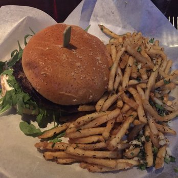Yard House - Lamb burger with feta cream cheese, caramelized jalapeño relish, and arugula with garlic fries on the side - Bars Near Me - Moorestown, New Jersey Yard House - Lamb burger with feta cream cheese, caramelized jalapeño relish, and arugula with garlic fries on the side - Bars Near Me - Moorestown, New Jersey