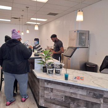 Georgesville Square Nutrition - two people standing at a counter - Juice Bars & Smoothies Near Me - Columbus, Ohio Georgesville Square Nutrition - two people standing at a counter - Juice Bars & Smoothies Near Me - Columbus, Ohio