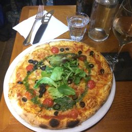 Margarita pizza with a glass of rosé. Margarita pizza with a glass of rosé.
