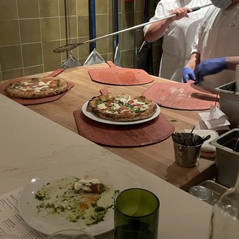 Sixty Vines - Pizza made in house at the bar - Wine Bars Near Me - Winter Park, Florida Sixty Vines - Pizza made in house at the bar - Wine Bars Near Me - Winter Park, Florida