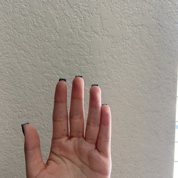 Kitty Nails And Spa - Manicure done with an SNS dipping powder in a dark green color - Nail Salons Near Me - Chino Hills, California